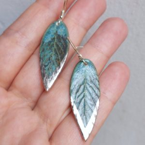 porcelain hanging earrings gray-green decorated with platinum